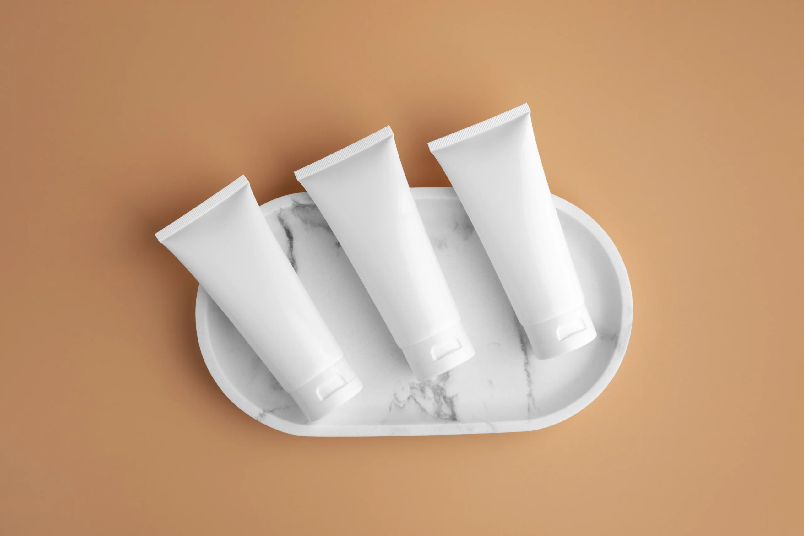 apricot color cosmetic products mockups 15