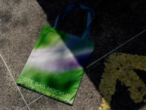 colorful tote bag mock up outdoors on golden hour