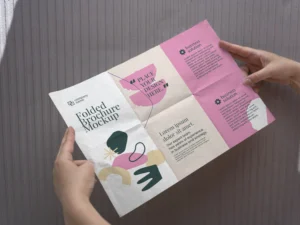 female hands holding trifold brochure mock up with abstract shapes 4
