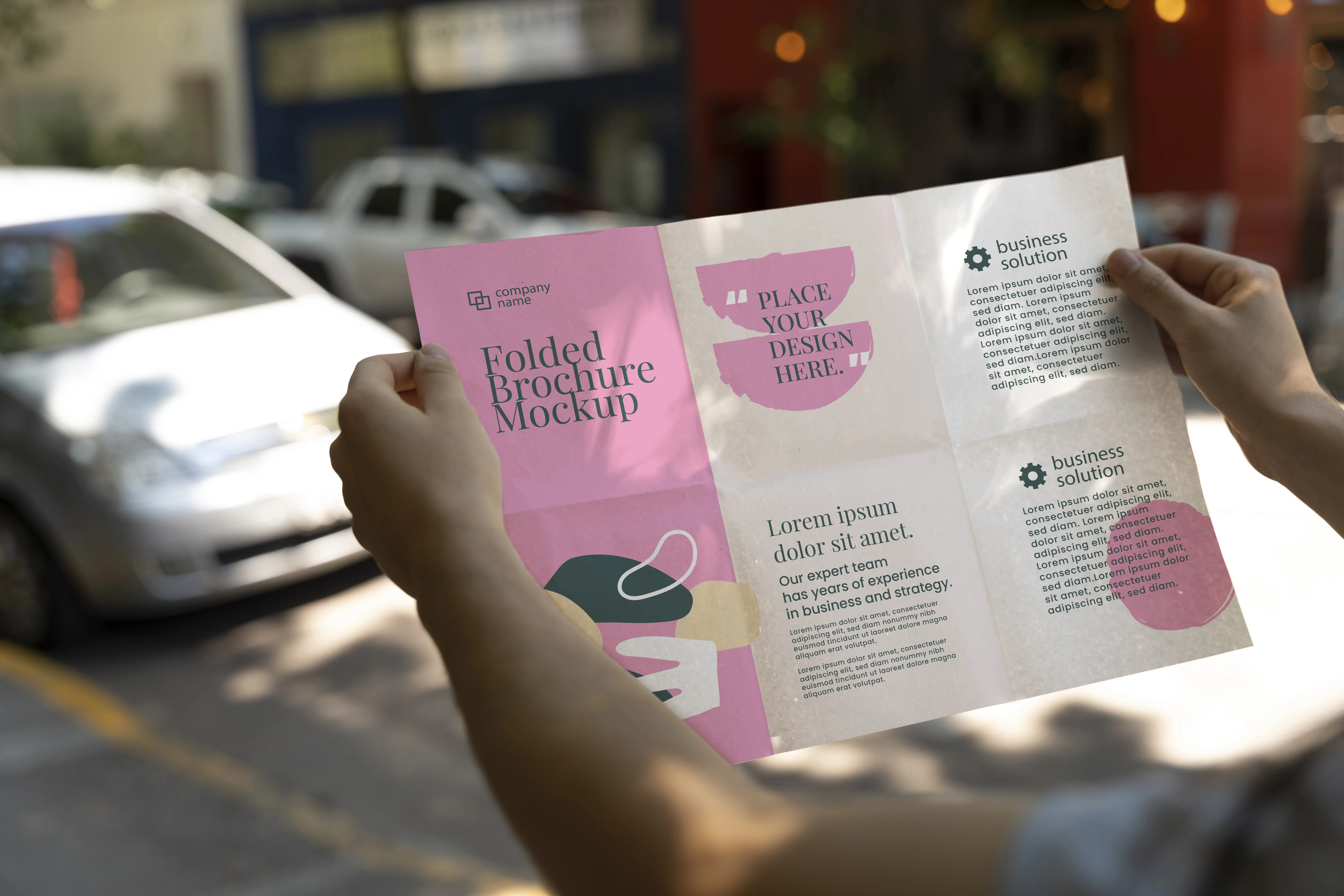 Female Hands Holding Trifold Brochure Mock-Up With Abstract Shapes 6