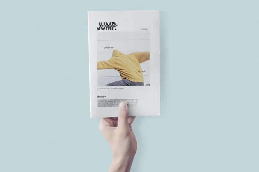 Hand Holding Book Cover Mockup