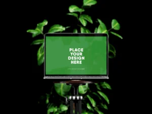 laptop on vintage chair with green plant mockup 1
