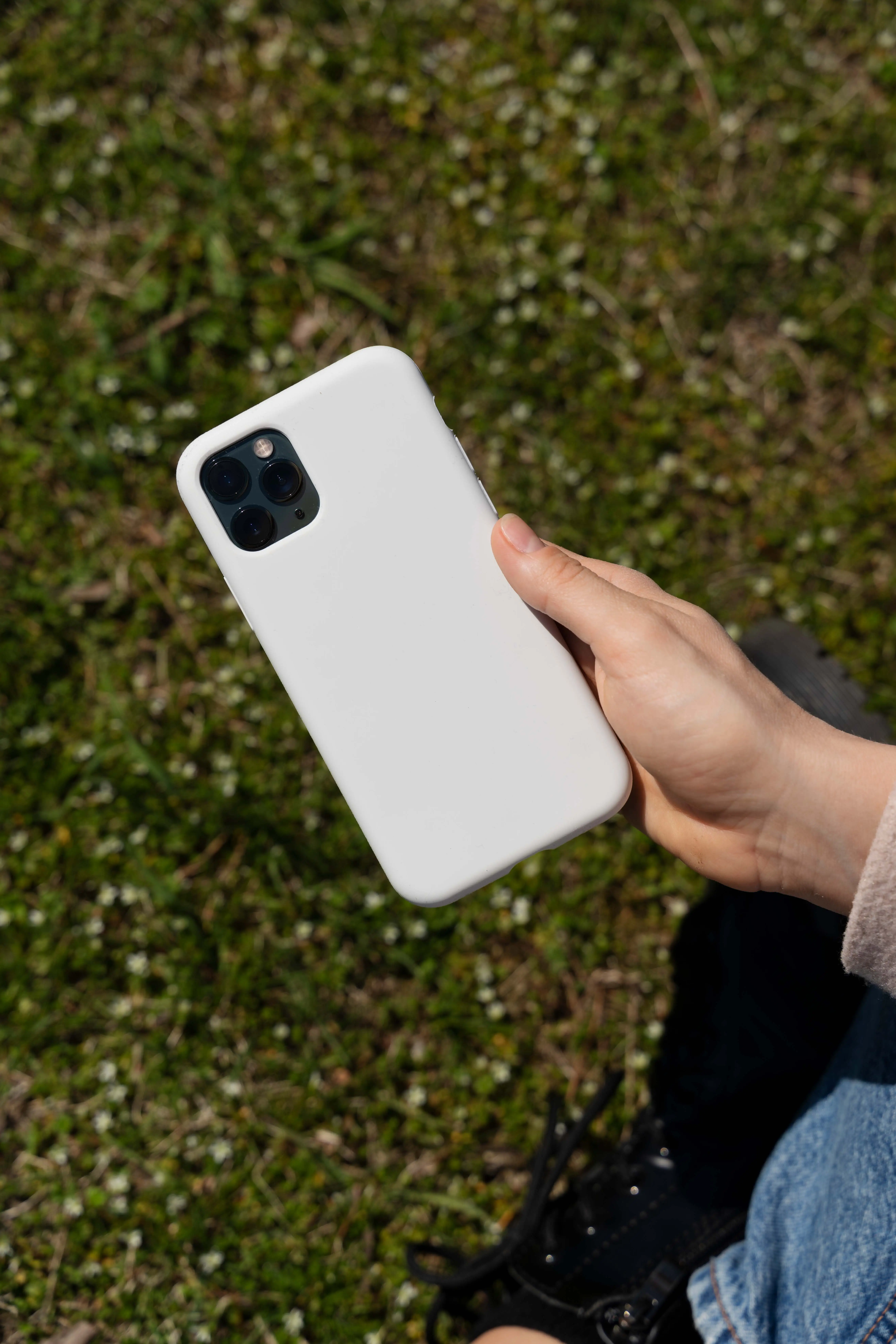 Person Holding Smartphone Mock-Up Outdoors 16