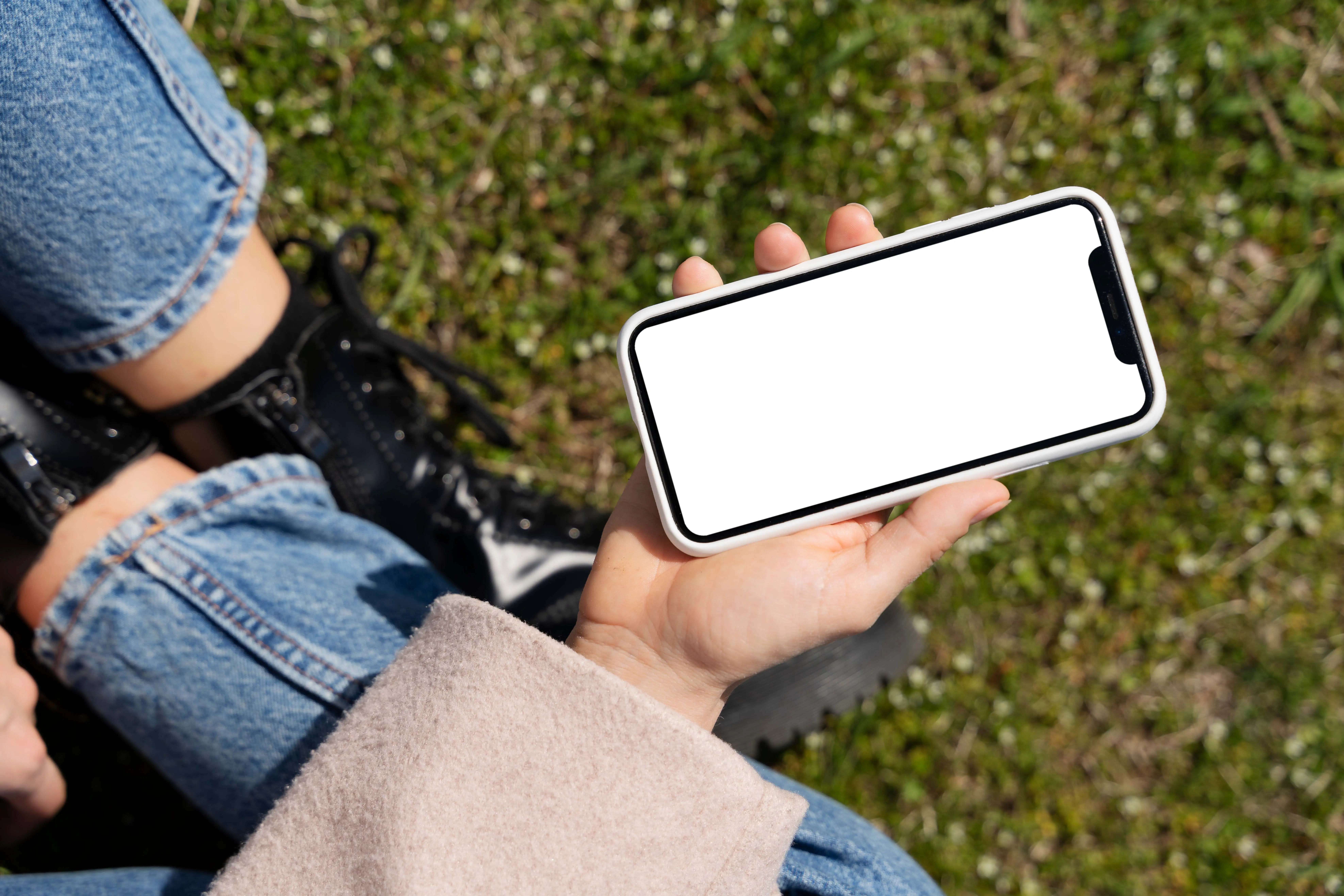 Person Holding Smartphone Mock-Up Outdoors 17