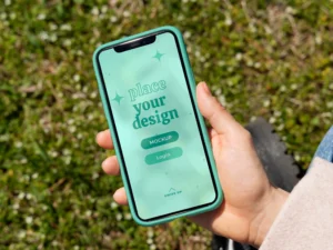 person holding smartphone mock up outdoors 18