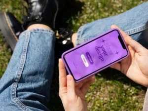 person holding smartphone mock up outdoors 19