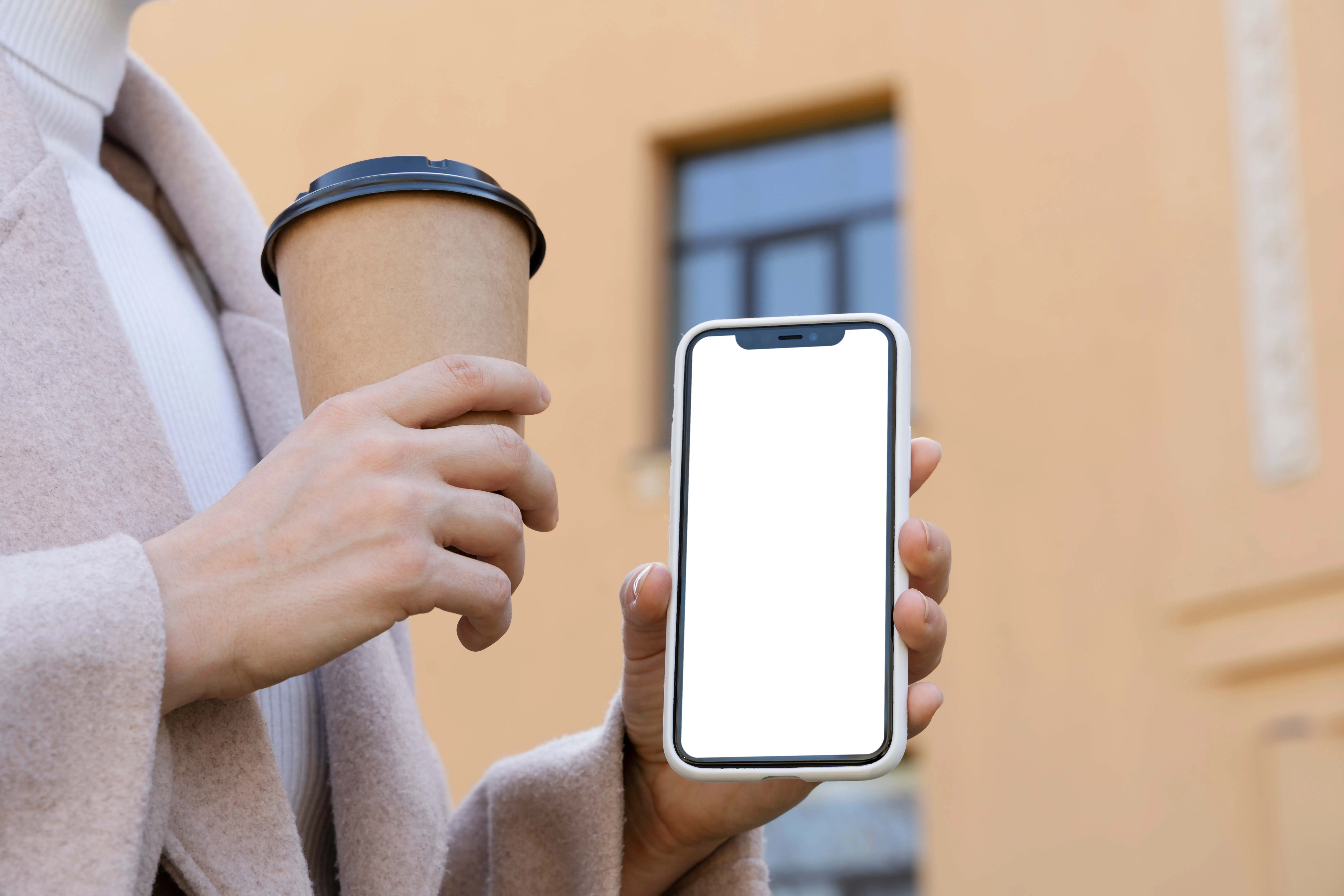 Person Holding Smartphone Mock-Up Outdoors 2