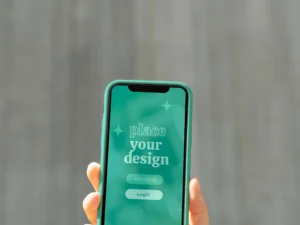 person holding smartphone mock up outdoors 21