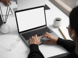 person typing on computer mockup set 18