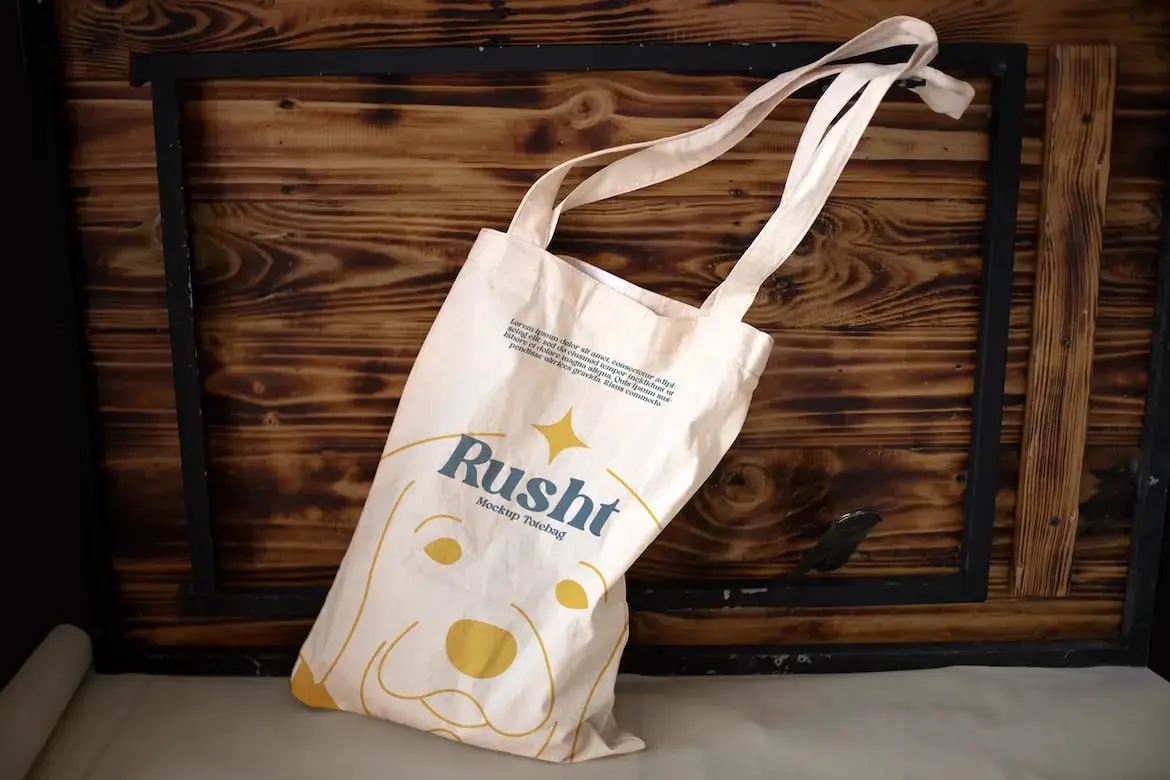 Reusable Tote Bag Mockup In Wood Background
