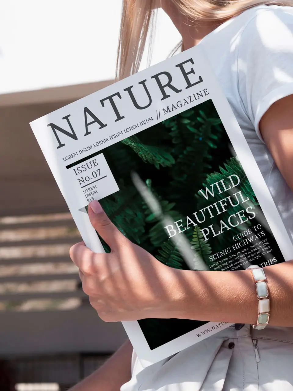 Woman Holding A Mock-Up Magazine